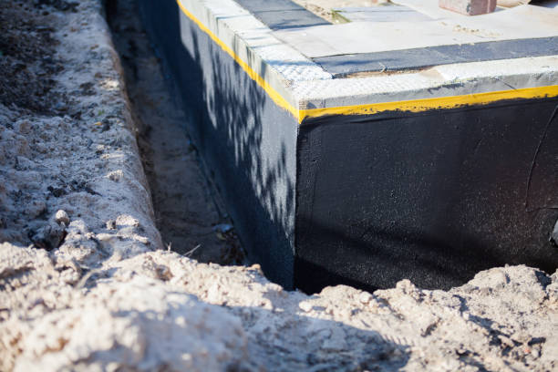 Professional Waterproofing technician working in Marysville, MI